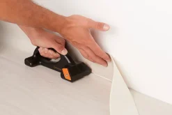 Magnusson Araseur sol souple noir et orange