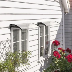 Outsunny Auvent marquise de porte design voûté arrondi dim. 122L x 89l x 24H cm polycarbonate PP noir