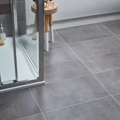 GoodHome Carrelage sol intérieur effet béton anthracite L.61,7 x l.30,7 cm x ép.7,4 mm, Konkrete