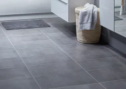 GoodHome Carrelage sol intérieur effet béton anthracite L.61,7 x l.30,7 cm x ép.7,4 mm, Konkrete