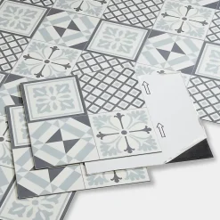GoodHome Dalle PVC adhésive effet carreaux de ciment noir et blanc L.30,5 x l.30,5 cm x ép.2 mm, Poprock