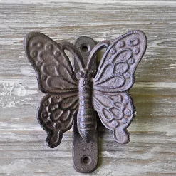 La Grande Prairie Heurtoir porte fonte Papillon 12x10x4cm