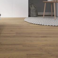 GoodHome Lame PVC clipsable Baila décor chêne moyen l. 122 x l. 15 cm