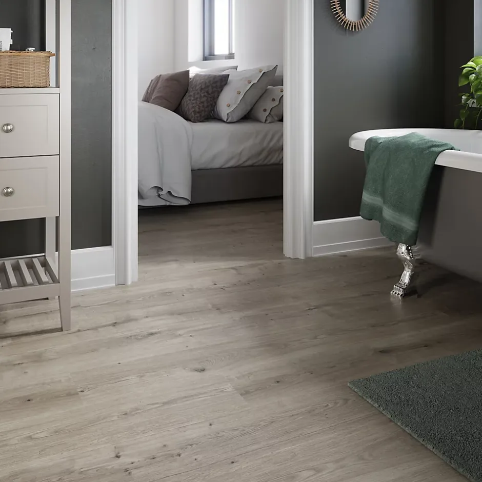 GoodHome Sol stratifié Rowley , passage élevé AC4, effet chêne grisé, L.129,2 cm x l.19,3 cm x ép.8 mm, résistant à l'eau